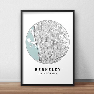 May include: A black and white map of Berkeley, California, in a circular frame with a light blue background. The text "BERKELEY CALIFORNIA" is below the map.