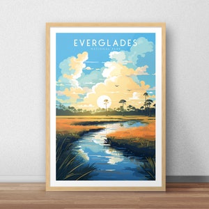 May include: A vintage-style poster with a blue sky and white clouds. The poster features a river winding through a grassy field with trees in the background. The text "EVERGLADES NATIONAL PARK" is at the top of the poster.