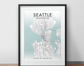 May include: A black and white map of Seattle, Washington with a light blue background. The map shows the city's streets and waterways. The text "Seattle, Washington" and "47.6062° N | 122.3321° W" are printed below the map.