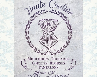 May include: A vintage-inspired stencil design featuring a corset, a laurel wreath, and the text "Haute Couture". The text "Mouchoirs Foulards Corsets Blouses Pantalons Mme Lignes 14 Rue de Rennes Paris" is also included.
