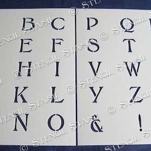 May include: A white stencil sheet with the alphabet in uppercase letters, numbers, punctuation marks, and an ampersand. The letters are in a traditional serif font.