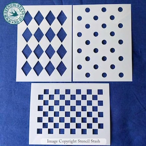May include: Three white plastic stencils with diamond, polka dot, and checkerboard patterns. The stencils are on a blue background. The text "Image Copyright Stencil Stash" is at the bottom.