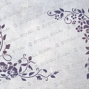 May include: A stencil featuring a floral design with intricate vines and leaves. The design is in a corner shape, perfect for adding a touch of elegance to any project.