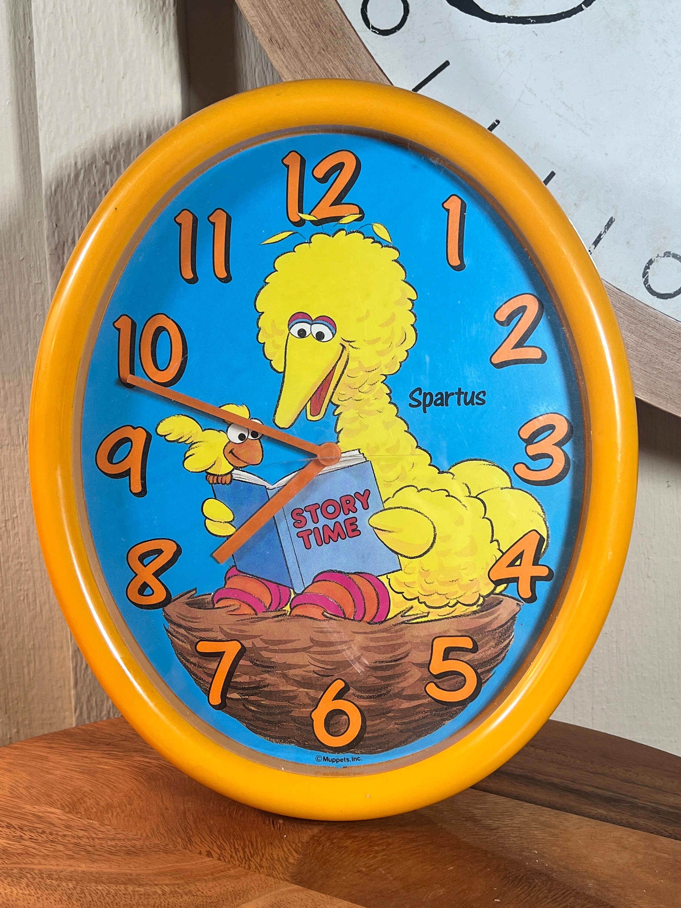 Oval Wall Clock With Bird