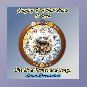 May include: A 12-inch wooden wall clock with a round face featuring a colourful illustration of birds in a nest. The clock face is surrounded by a wooden frame with a brown finish. The clock face has a white background with a black clock face and black hands. The clock face also has a variety of bird names and songs written around the edge.