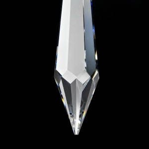 May include: A clear crystal teardrop pendant with a faceted design and a small hole at the top for hanging.