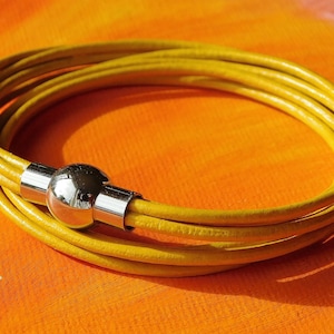 Ladies / Womens Yellow leather multi-strand, wraparound bracelet with a stainless steel magnetic clasp by Lyme Bay Art.