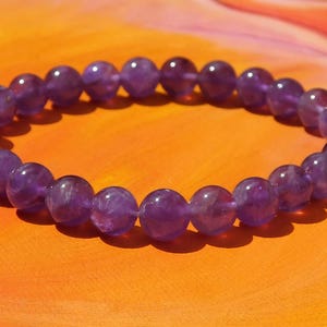 Mens / ladies 8mm Natural Amethyst Gemstone Beaded Bracelet by Lyme Bay Art.