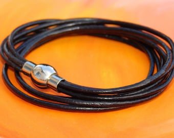 Ladies / Womens Black leather multi-strand, wraparound bracelet with a stainless steel magnetic clasp by Lyme Bay Art.