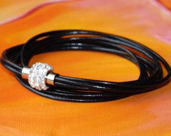 Ladies / womens Black leather multi-strand, wraparound bracelet with a stainless steel magnetic clasp by Lyme Bay Art.