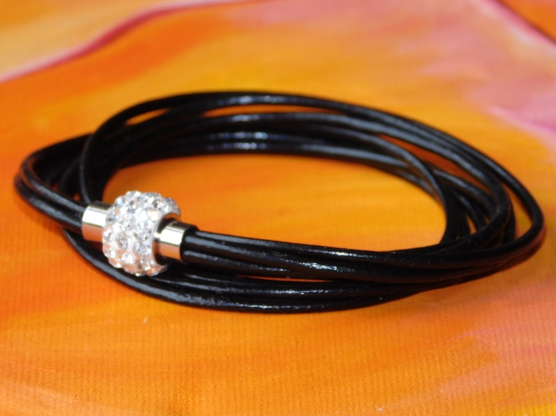 Ladies / womens Black leather multi-strand, wraparound bracelet with a stainless steel magnetic clasp by Lyme Bay Art. image 1