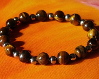 Mens / ladies 8mm Natural Tiger's Eye Gemstone and stainless steel Bracelet by Lyme Bay Art.
