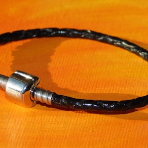 Ladies 3mm Black Braided leather & stainless steel European charm bracelet by Lyme Bay Art.