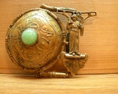 Late Meiji Era Bronze Belt Buckle Figural Geisha Girl with Peking Glass Center Highly Detailed for it 39 s size Antique 19th Century