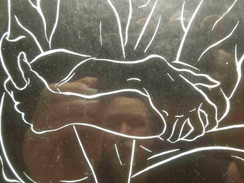 May include: A black and white line drawing of hands holding each other. The image has a reflective surface, with white lines outlining the hands and arms. The style is simple and elegant, suggesting a theme of connection or support.