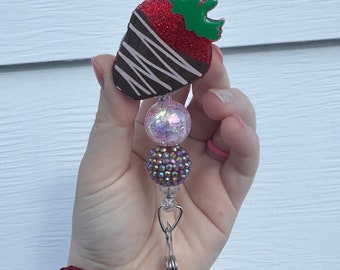 Chocolate covered strawberry badge reel