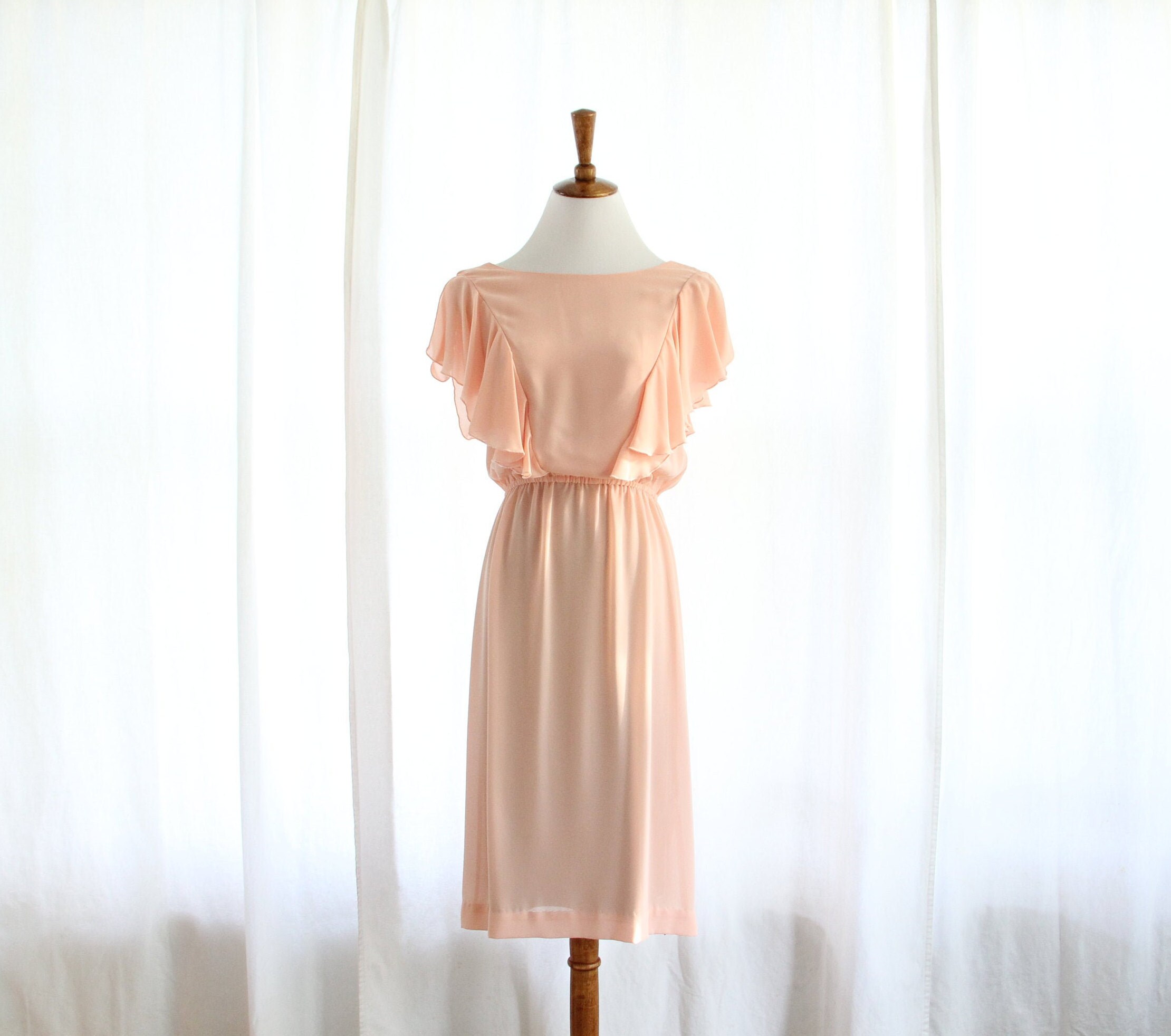 blush flutter sleeve dress
