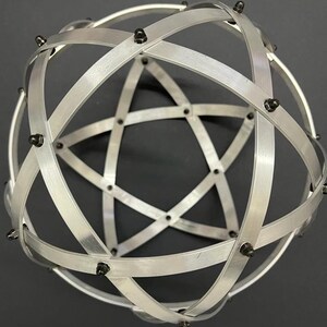 Genesa Pentasphere Brushed Natural Aluminium 21 cm diameter bands 10 mm wide intertwined symmetrically fixed with black blind nuts