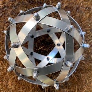 Genesa Stainless steel pentasphere, 10 cm in diameter, fastening with gray dice: always carry it with you