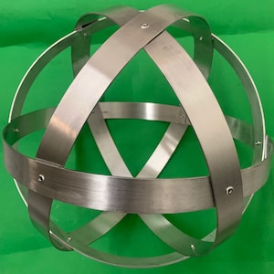 Genesa Crystal in Brushed Natural Aluminum 32 cm in diameter with 30 mm wide bands, symmetrical weaves and aluminum rivets