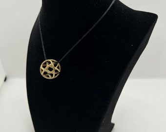 Genesa Crystal Raw Pendant Medium 22mm diameter: Bronze and brass alloy