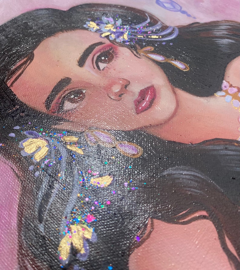 May include: A painting of a woman with long dark hair, wearing a purple and gold flower crown. The background is a soft pink.