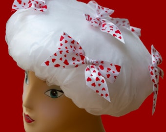 Such a cute, Shower cap, XOXO - white ribbon with red hearts tied in bows.