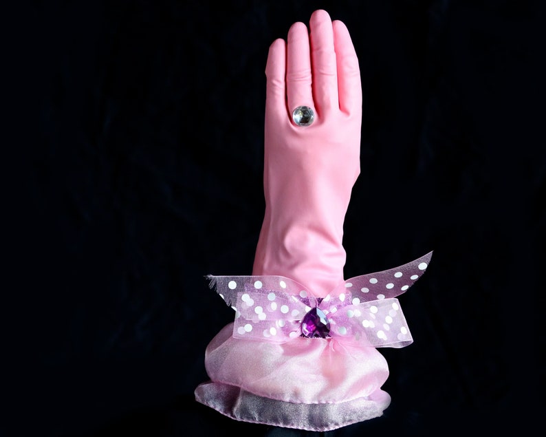 Lady Diamond Designer Dish Gloves, We LOVE this pair of gloves, pink latex, size medium, with a polka dot ribbon bow, purple sparkle band, jewel embellishment and of course a large diamond ring. (main product view)