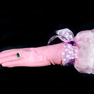 Lady Diamond Designer Dish Gloves, We LOVE this pair of gloves, pink latex, size medium, with a polka dot ribbon bow, purple sparkle band, jewel embellishment and of course a large diamond ring. (another product view)
