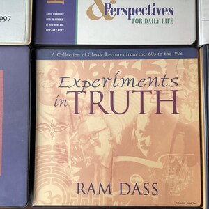 May include: A book cover with a yellow, orange, and brown background. The title is "Experiments in TRUTH" by Ram Dass. A collection of classic lectures from the 60s to the 90s.