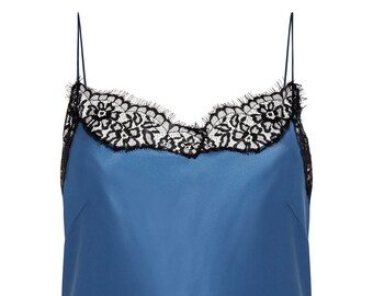 May include: A blue satin tank top with a black lace trim around the neckline.