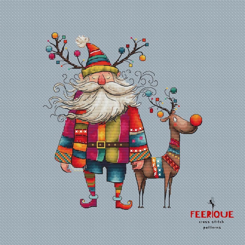 May include: A colorful cross stitch pattern featuring a whimsical Santa Claus with a long white beard and a reindeer with a red nose. The Santa Claus is wearing a red, green, and blue patterned jacket and a colorful scarf. The reindeer is wearing a colorful patterned scarf. The pattern is titled "FEERIQUE cross stitch patterns".