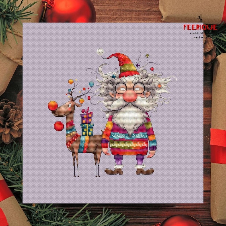 May include: A cross stitch pattern featuring a whimsical Santa Claus with a long white beard and a reindeer carrying presents. The Santa Claus is wearing a colorful sweater and a red hat. The reindeer is brown with a red nose and a colorful scarf. The pattern is on a light purple background.