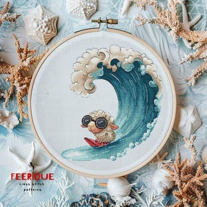 May include: Cross-stitch embroidery in a wooden hoop featuring a sheep surfing a wave. The sheep wears sunglasses and rides a red surfboard. The wave is blue and white. The background includes seashells and coral.