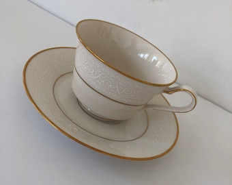 Vintage Noritake China Tulane Pattern Tea Cup and Saucer White Scroll Trim with gold inner and outer ban