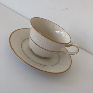 Vintage Noritake China Tulane Pattern Tea Cup and Saucer White Scroll Trim with gold inner and outer ban