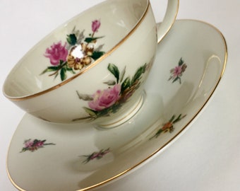 Vintage Teacup and Saucer with delicate floral print by Crescent