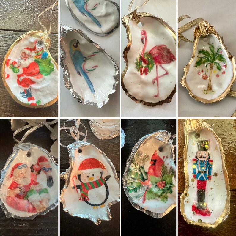 May include: Nine oyster shell ornaments with various holiday themes.  The ornaments feature a Santa Claus, a penguin, a nutcracker, a flamingo, a palm tree, a cardinal, and a blue jay.