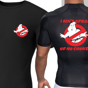 May include: Black t-shirt with a white ghostbuster logo on the front and a red circle with a white ghostbuster logo and the text "I ain't afraid of no chokes" on the back.
