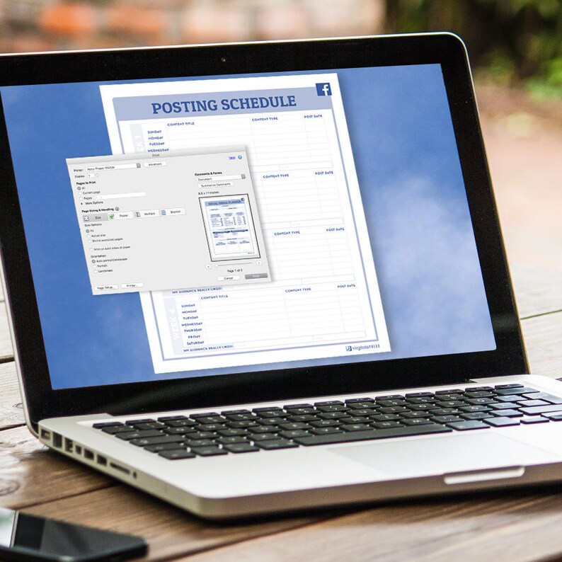 May include: A laptop computer with a white case and a black keyboard. The screen displays a document titled "Posting Schedule" with a Facebook logo in the top right corner. The document is a grid with columns for "Content Type", "Content Brief", "Scheduled Time", and "Post Date".