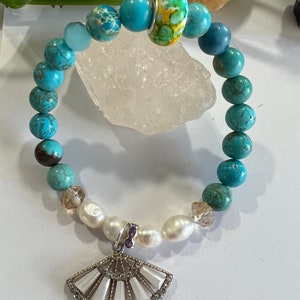 Pulsera de perlas de agua dulce con jaspe imperial azul. Juntos hicieron un hermoso recordatorio de la belleza y el poder de la naturaleza y la paz.