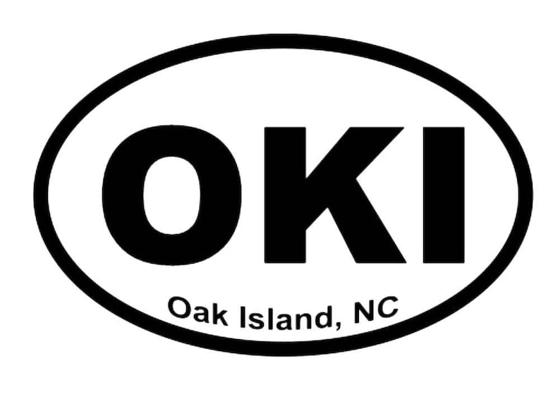 May include: Black and white oval sticker with the text "OKI" and "Oak Island, NC".