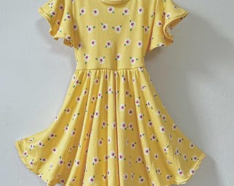 Vestido con margaritas danzantes: vestido circular con mangas onduladas estilo bailarina