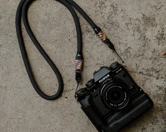 Black Camera neck strap with optech qd mini loop attachments
