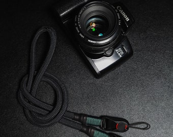 Black Camera neck strap with quick release attachments