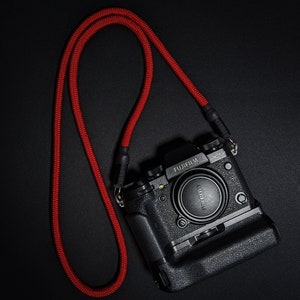 Red Camera neck strap for fujifilm, canon, leica, nikon sony, film cameras.