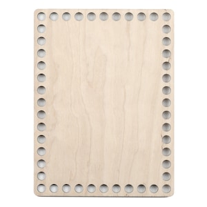 May include: A rectangular, unfinished wooden basket base with evenly spaced holes around the perimeter. The light-colored wood grain is visible, and the base is ready for crafting projects.