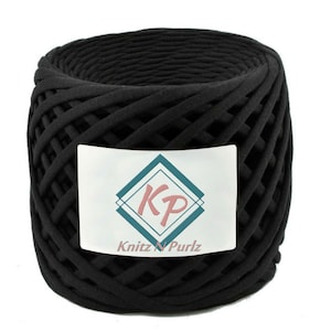 May include: A black cotton rope yarn skein with a white label that says "KP Knit'z N' Purls".