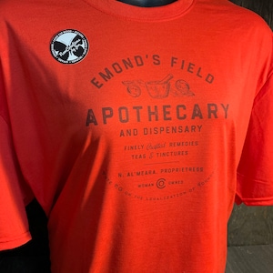 Emond&#39;s Field Apothecary - Wheel of Time Vintage Randland Souvenir Lightweight Tee - Multiple Color Options - UNISEX SIZING