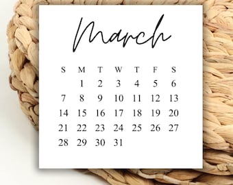 May include: A white calendar with the word "March" at the top and the days of the week listed across the top row. The numbers 1 through 31 are listed in rows below the days of the week.